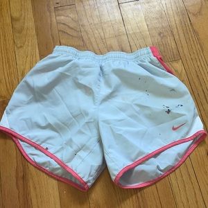 white and pink nike shorts